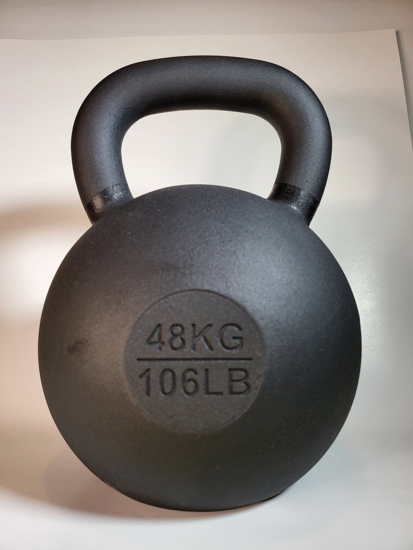 48 kg (106 lb) Powder-Coated Cast-Iron Kettlebell – Black | SoCal Kettlebellz