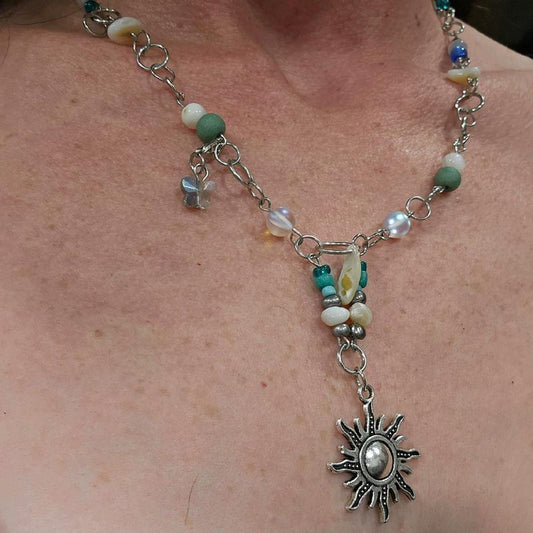 Moonstone and Sunbeam Charm Necklace with Gemstones and Blue Accents