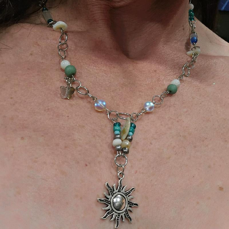 Moonstone and Sunbeam Charm Necklace with Gemstones and Blue Accents