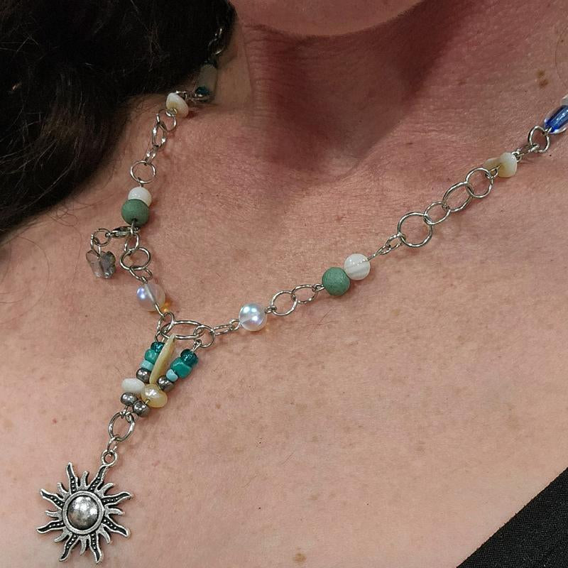 Moonstone and Sunbeam Charm Necklace with Gemstones and Blue Accents
