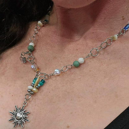 Moonstone and Sunbeam Charm Necklace with Gemstones and Blue Accents