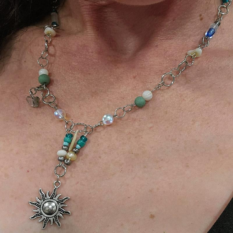 Moonstone and Sunbeam Charm Necklace with Gemstones and Blue Accents