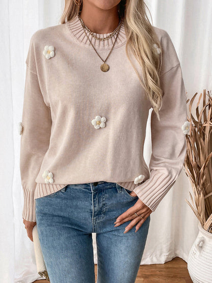 Knitted crew neck sweater with floral details